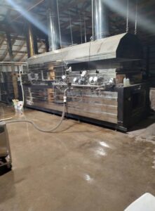 image of machine making syrup