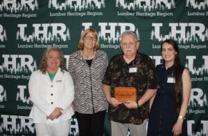 Rich Wykoff accepts Community Champion Award among state and local representatives