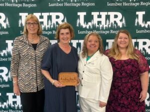 Linda Devlin accepts Legacy Award among state and local representatives